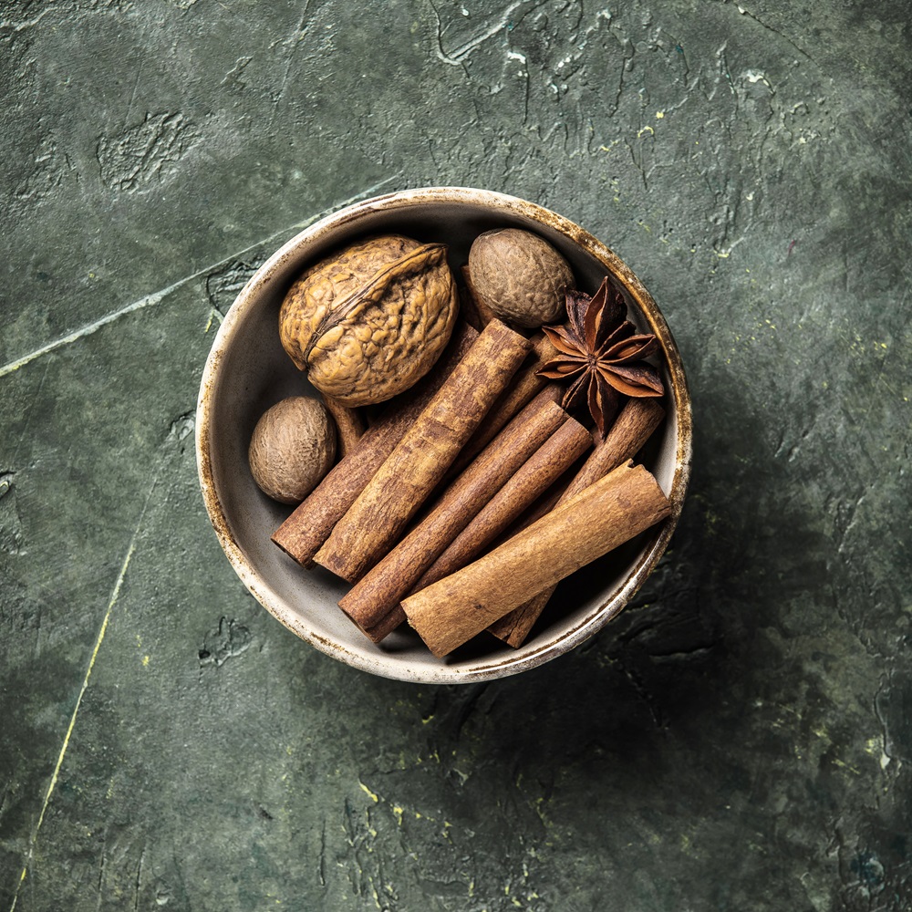 Set of spices on rustic background, flat lay